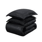 Cubrecama Martiné embossed Sonya con sherpa negro con fundas