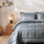 PLUMON EMBOSSED COLOR SOLIDO CON SHERPA - MARTINÉ